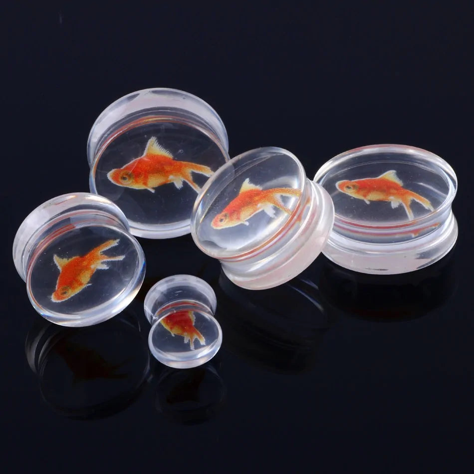 Medidores de oreja de acrílico líquido Golden Fish: Joyería para piercing corporal